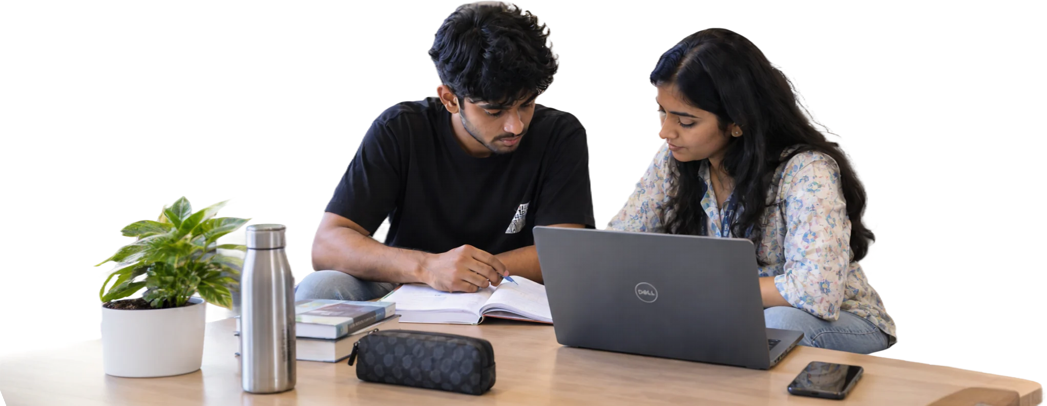 Students training together on laptops